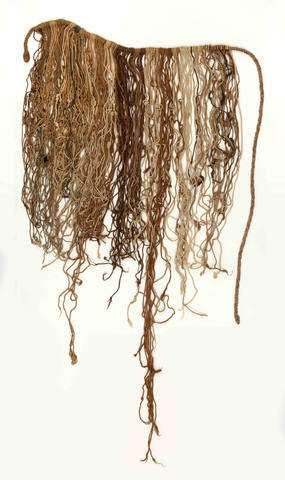 Many brown string with knots along some hang from a main string going along the top.